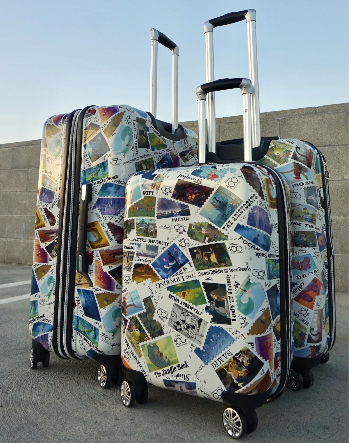 Ful Disney Stamps limited edition hard-sided 3 piece spinner suitcases rolling luggage set