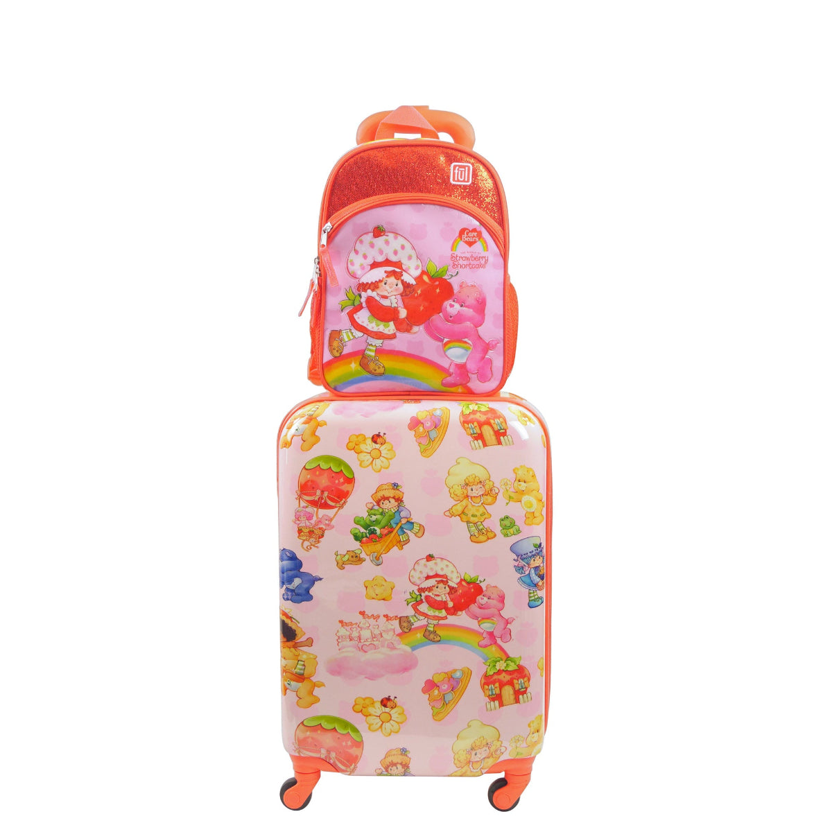 Make every adventure sweet with the Strawberry Shortcake and Care Bears 2-Piece Travel Set by Ful, a 21" rolling suitcase with a matching 13" backpack.