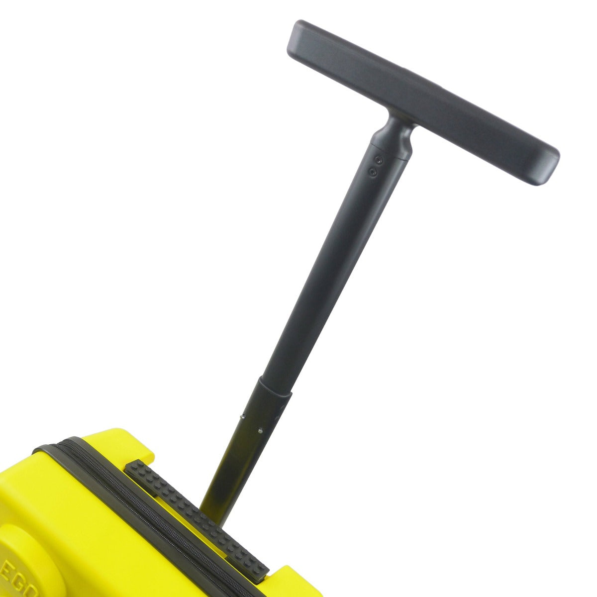 Yellow Lego Signature Brick Trolley 22" hard-sided carry-on spinner suitcase for traveling